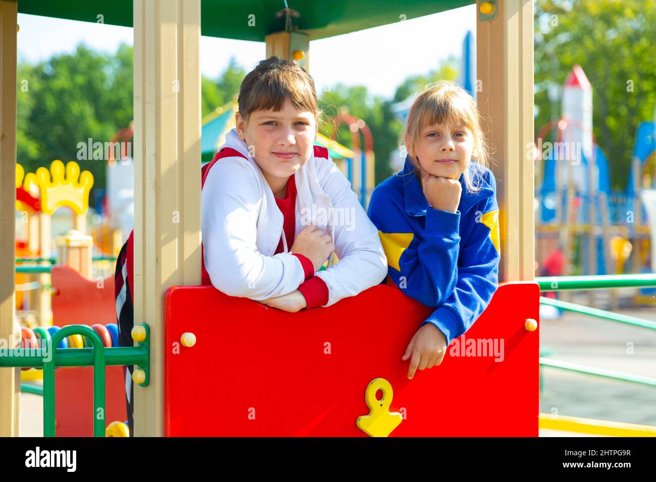 Portraits of two teenage girls on the playground Stock Photo - Alamy
