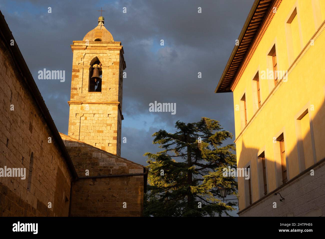 Bell tower of the church of Saints Pietro and Andrea, Trequanda Village, Crete Senesi area, Siena province, Tuscany, Europe Stock Photo