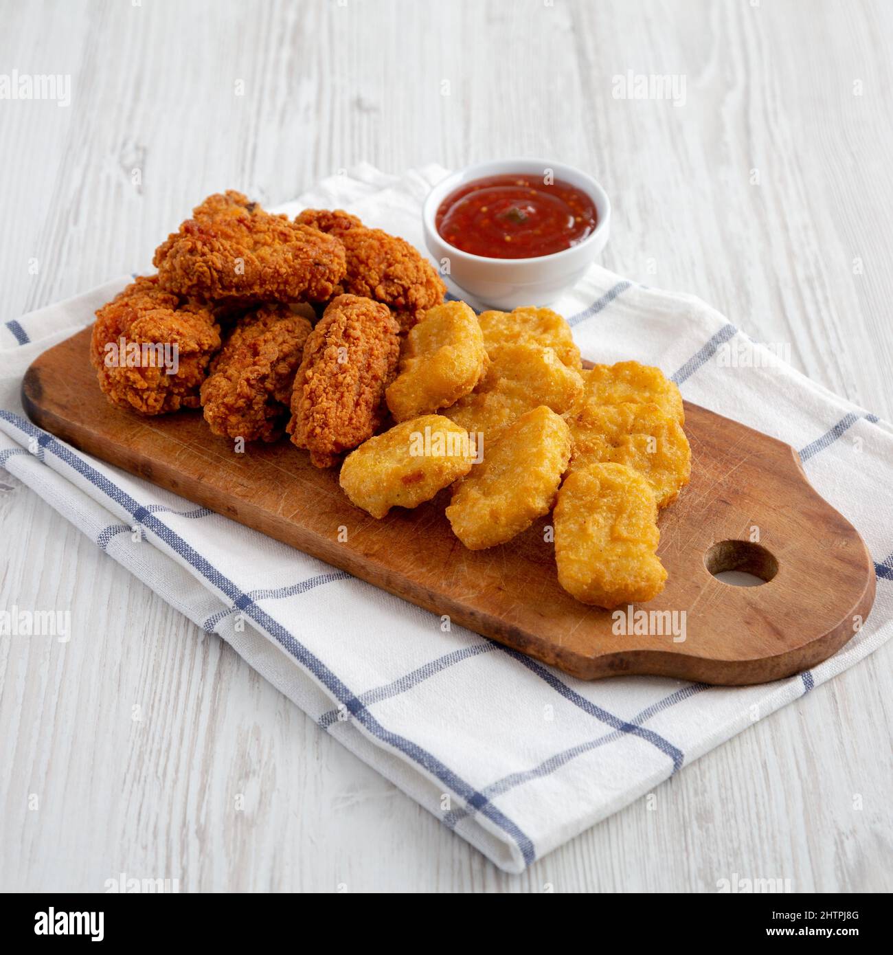Homemade Crispy Fried Chicken Wings and Nuggets with Sweet and Sour