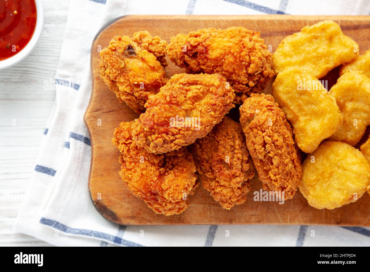 Homemade Crispy Fried Chicken Wings and Nuggets with Sweet and Sour