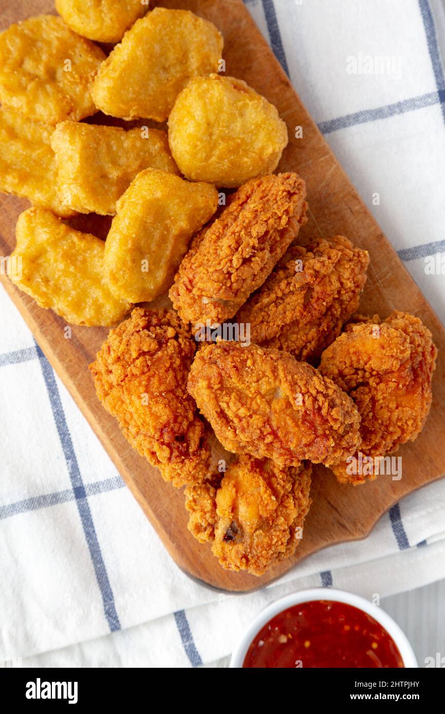 Homemade Crispy Fried Chicken Wings and Nuggets with Sweet and Sour