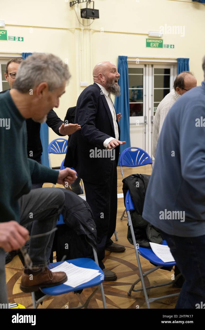 Brighton City Singers with choirmaster MJ Paranzino in Hove, East Sussex, UK Stock Photo