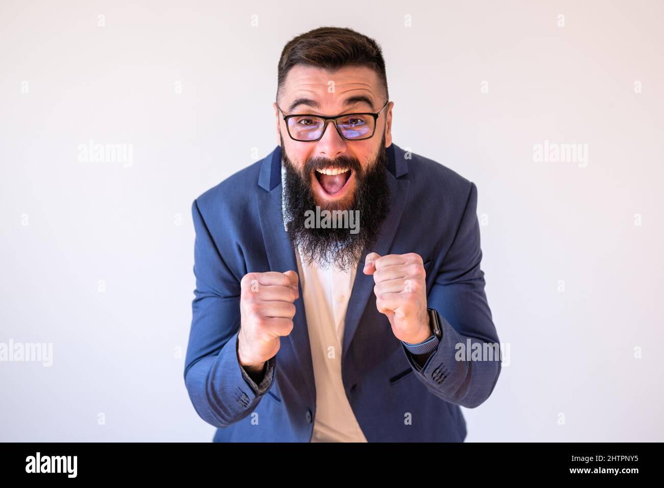 Portrait of ecstatic businessman. Copy space on image for your text or advert. Stock Photo