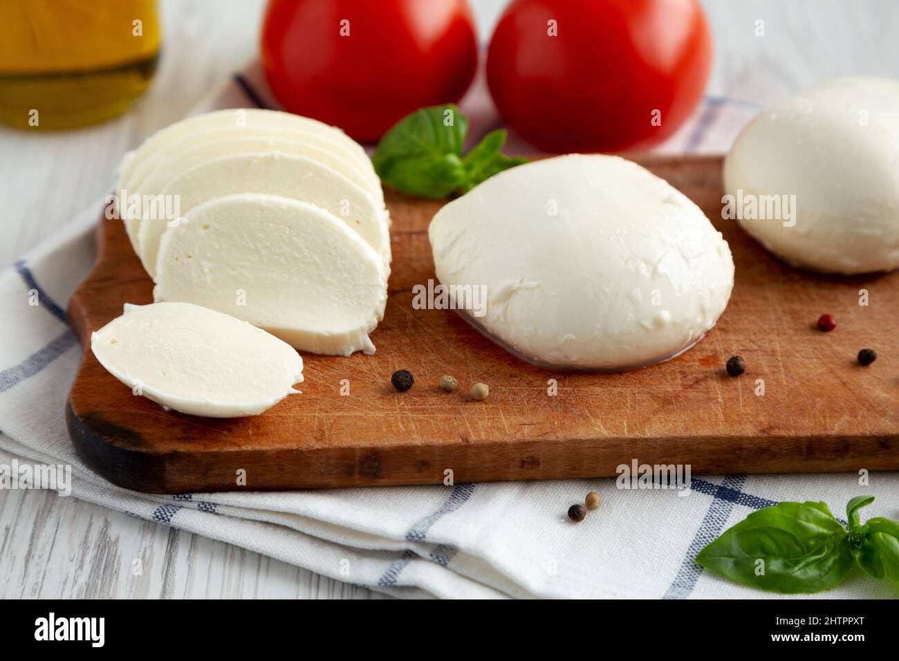 Homemade Mozzarella Cheese with Tomato, Basil and Olive Oil, side view
