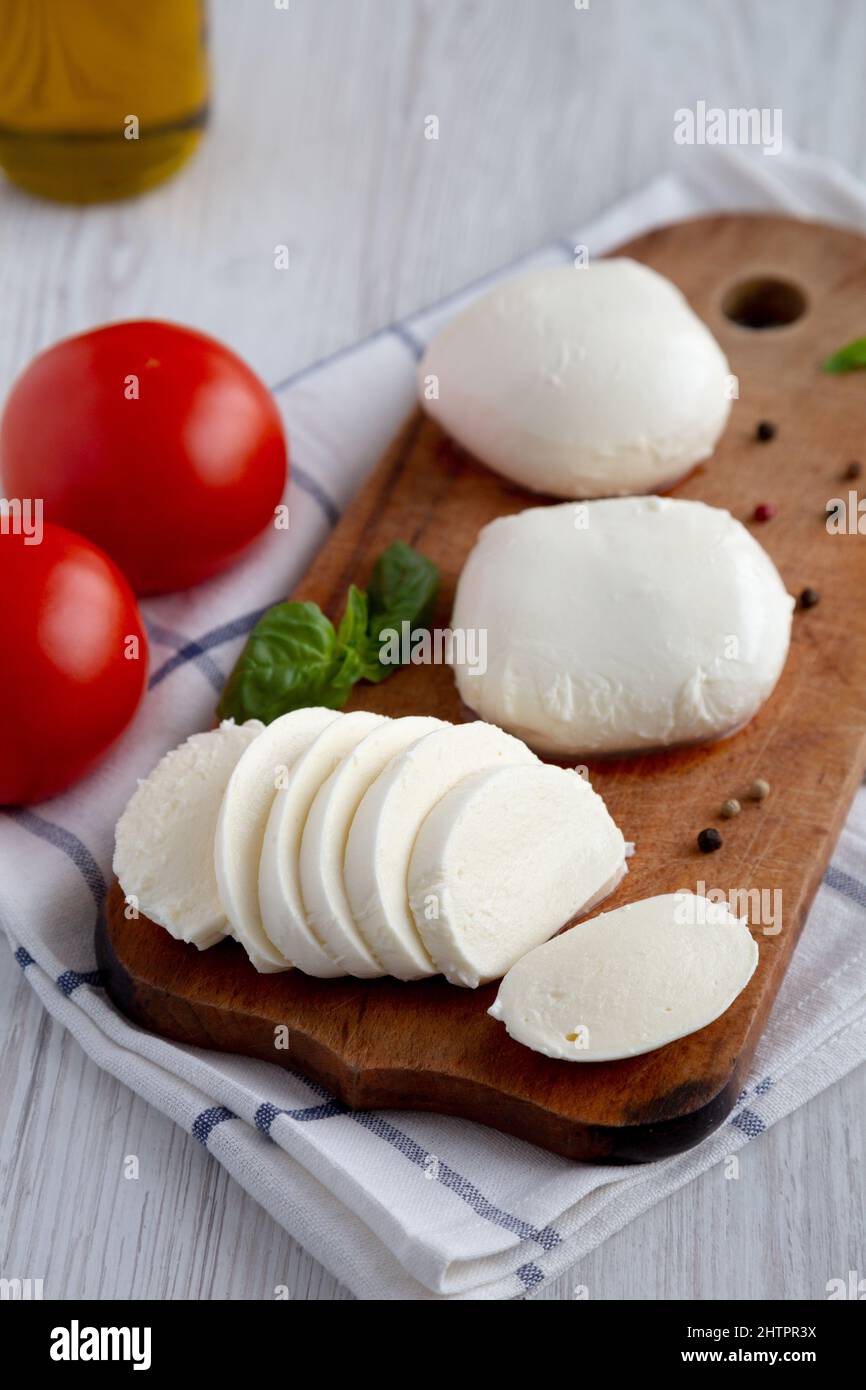 Homemade Mozzarella Cheese with Tomato, Basil and Olive Oil, side view