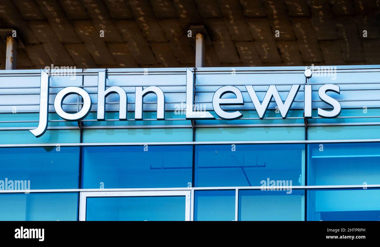 John Lewis sign over the entrance to the department store in Liverpool ONE shopping centre Stock Photo