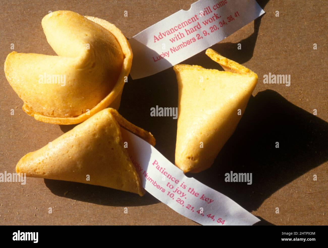 Fortune cookies with fortune message and lucky numbers Stock Photo