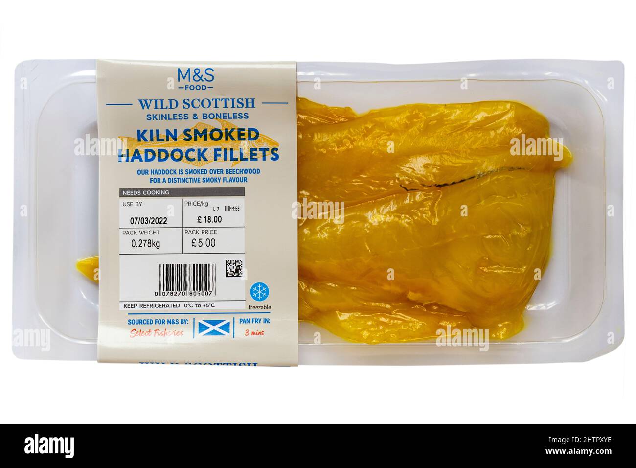 Pack of Wild Scottish Kiln smoked haddock fillets skinless & boneless from M&S isolated on white background Stock Photo