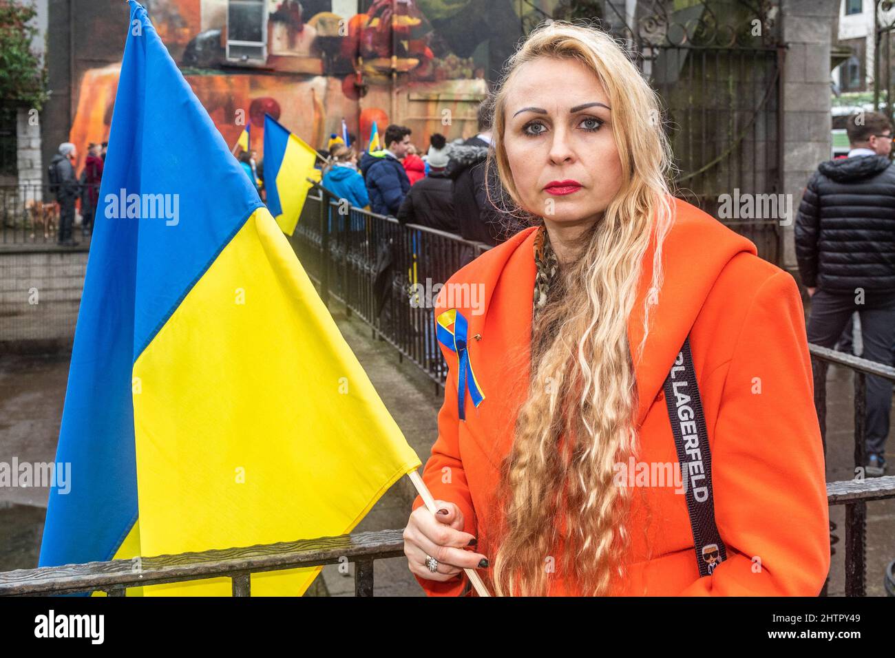 Cork, Ireland. 2nd Mar, 2022. Around 100 people gathered in Bishop Lucey Peace Park in Cork city today, in solidarity with the people of Ukraine. The Cork Lore Mayor, Cllr. Colm Kelleher, laid a wreath and tied a ribbon to the gates of the park. Ukranian national Svetlana Zakharova, who has lived in Cork for 19 years, attended the protest. Credit: AG News/Alamy Live News Stock Photo