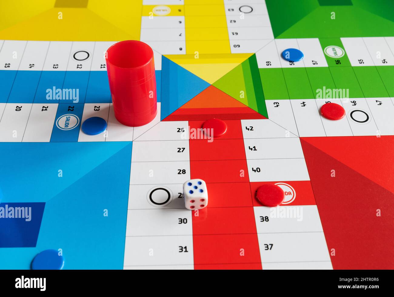 Classic Parcheesi game board with tokens and dice Stock Photo Alamy