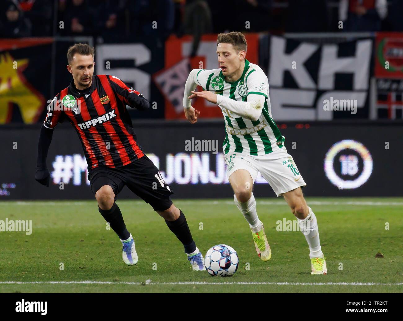 Lyes Houri of MOL Fehervar FC challenges David Siger of