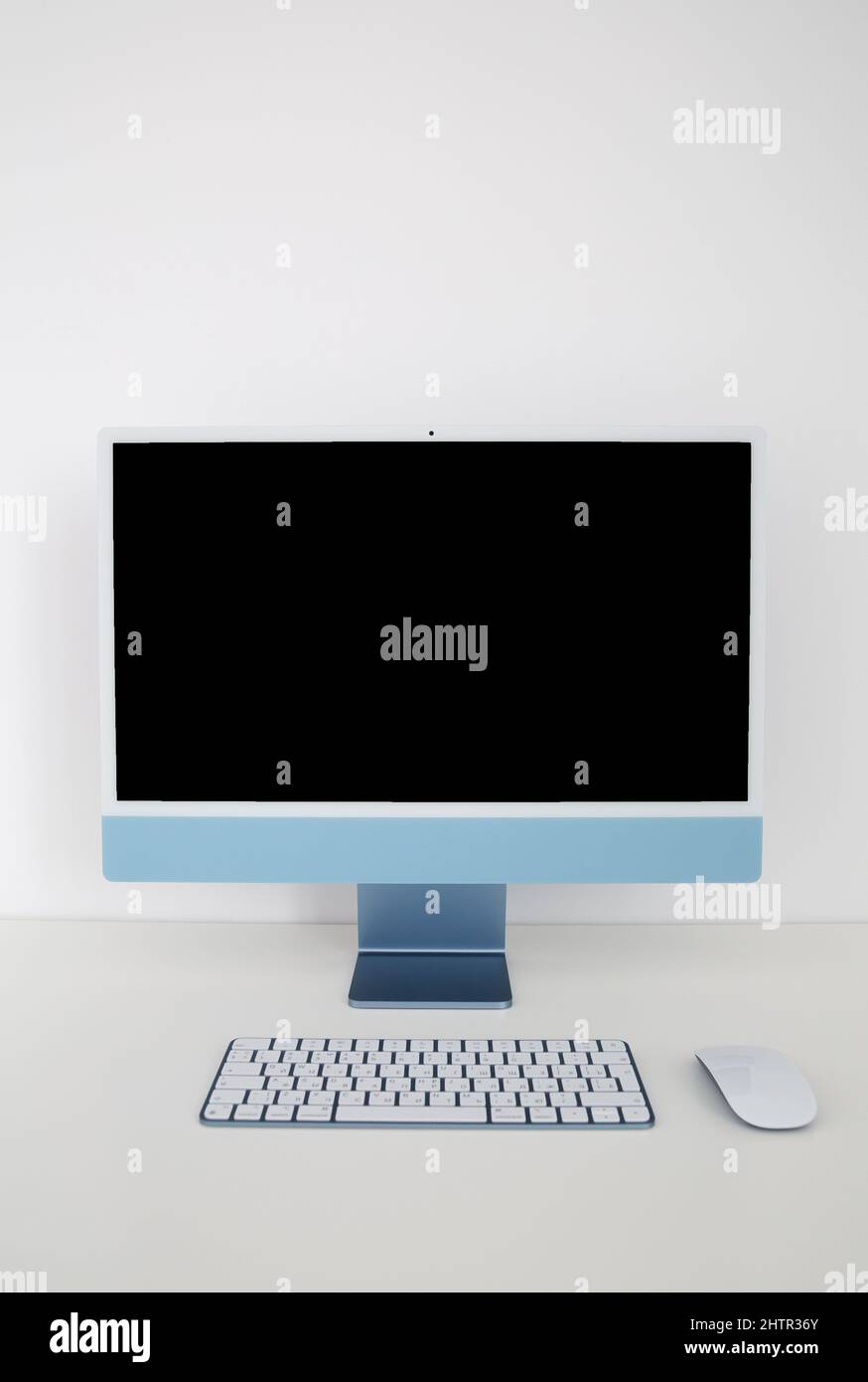 Desktop computer with wireless keyboard and mouse Stock Photo Alamy