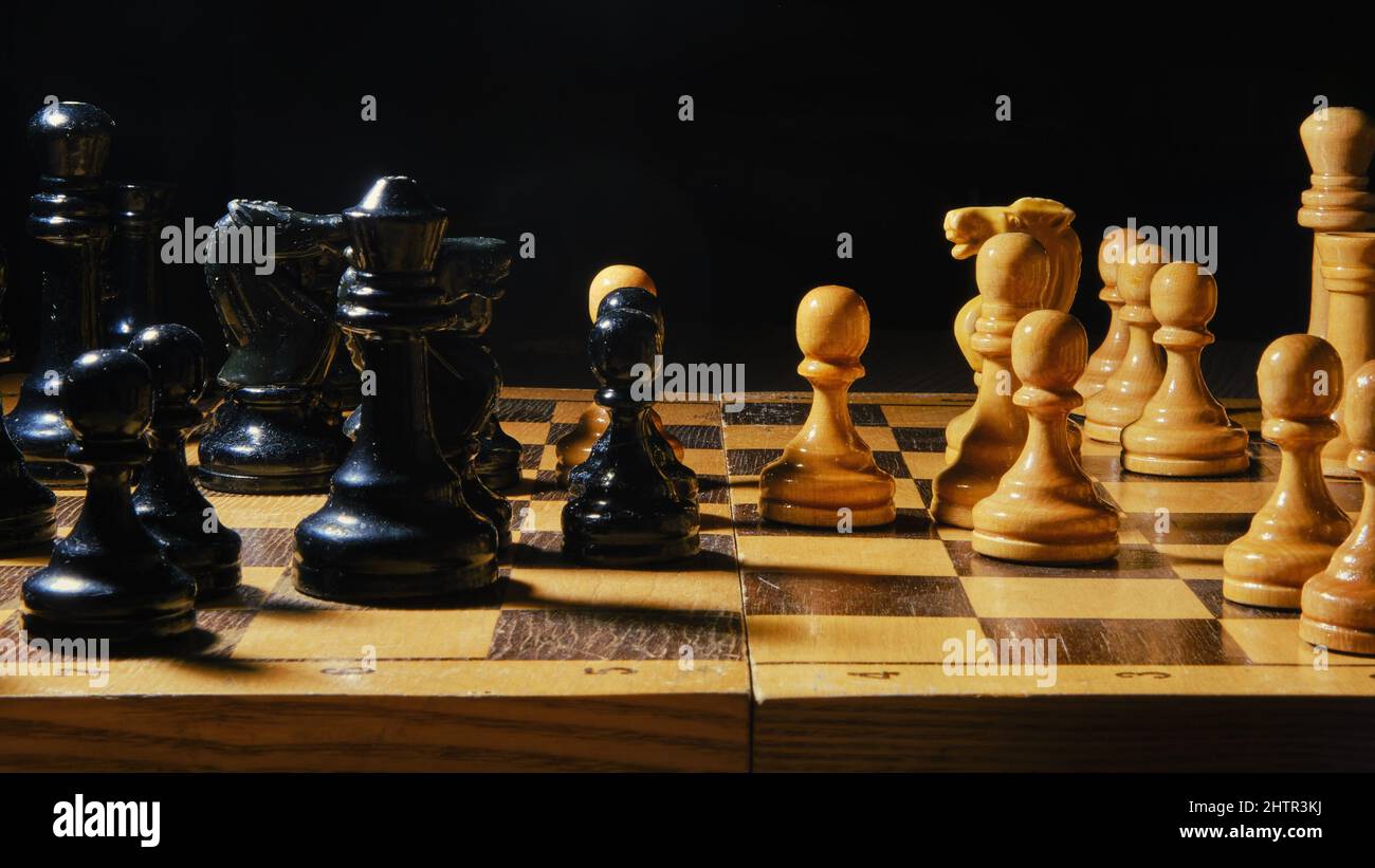 The opening of the chess game French defense, black background Stock Photo  - Alamy