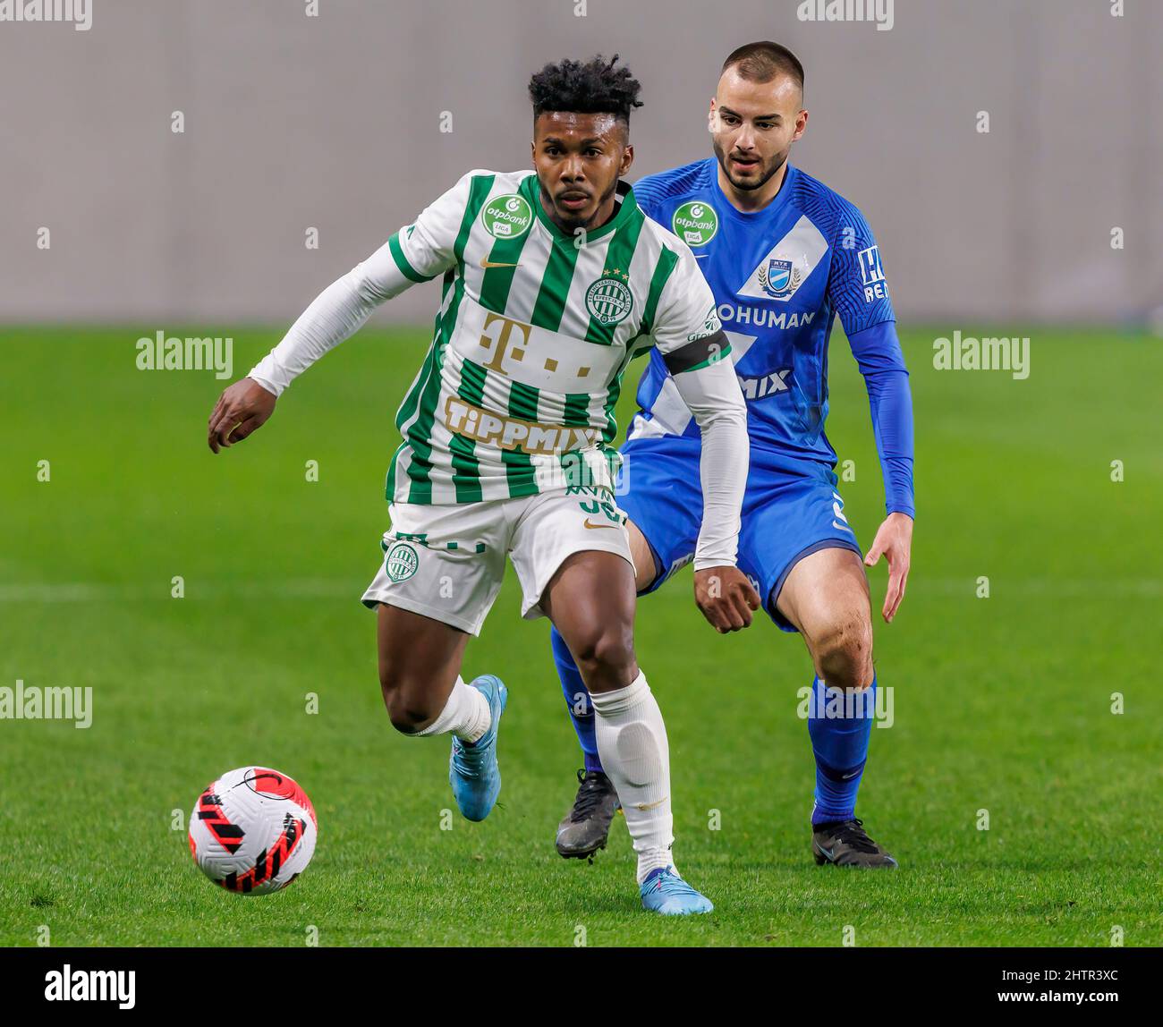 BUDAPEST, HUNGARY - MARCH 6: Lazar Cirkovic of Kisvarda Master Good  challenges Jose Marcos Marquinhos of Ferencvarosi TC during the Hungarian  OTP Bank Liga match between Ferencvarosi TC and Kisvarda Master Good at  Groupama Arena on