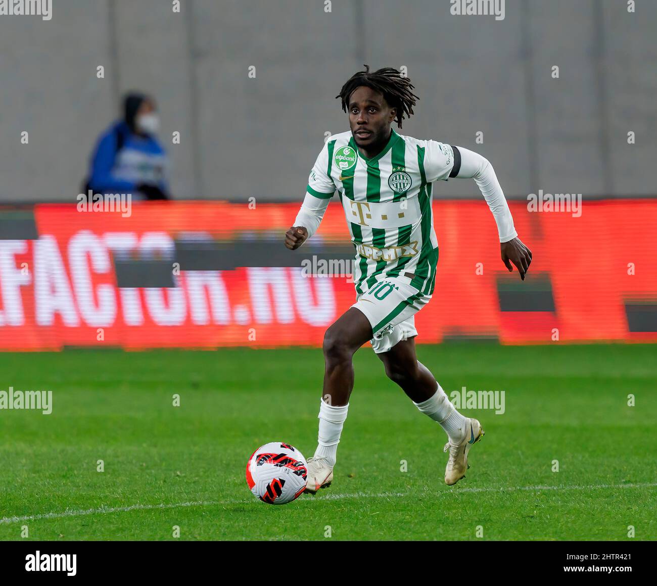 BUDAPEST, HUNGARY - AUGUST 29: (l-r) Tokmac Chol Nguen of Ferencvarosi TC  celebrates his goal in front of Gergo Lovrencsics of Ferencvarosi TC during  the UEFA Europa League Play-off Second Leg match