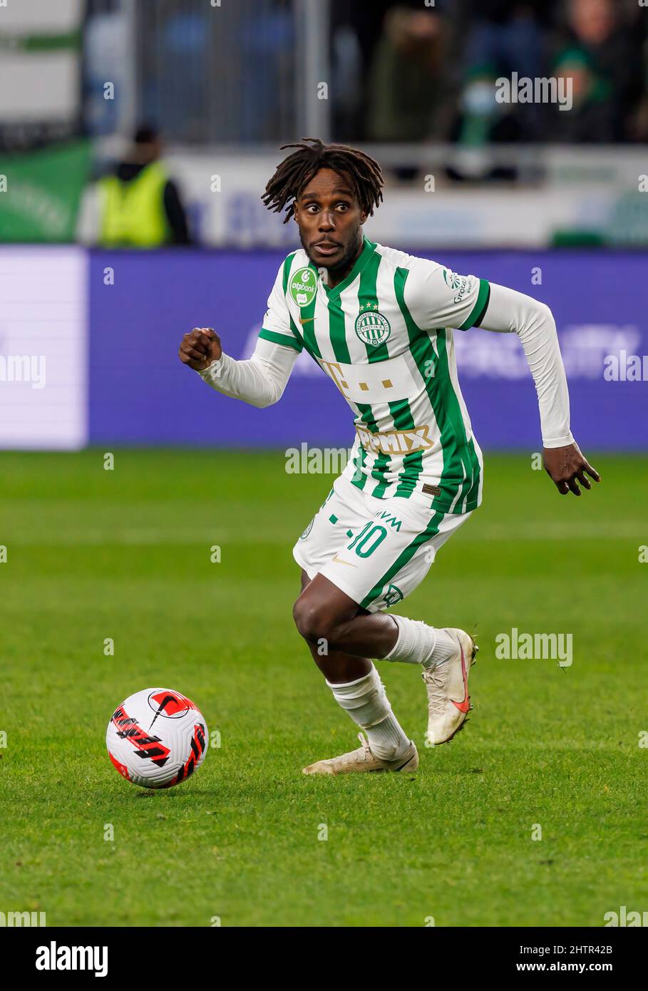 BUDAPEST, HUNGARY - AUGUST 29: (l-r) Tokmac Chol Nguen of Ferencvarosi TC  celebrates his goal in front of Gergo Lovrencsics of Ferencvarosi TC during  the UEFA Europa League Play-off Second Leg match