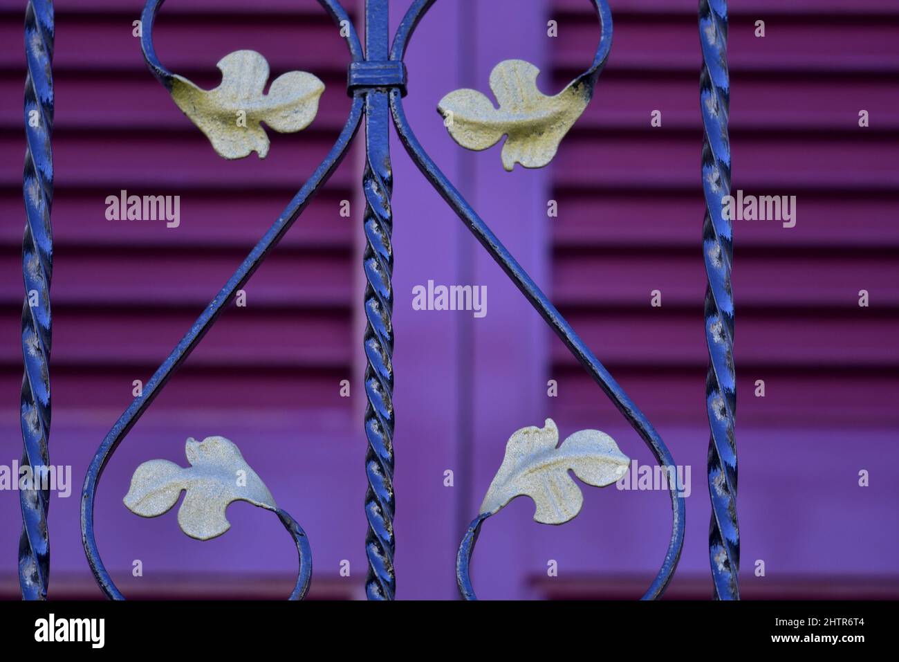 Traditional custom made wrought iron balcony railing with golden leaf ...