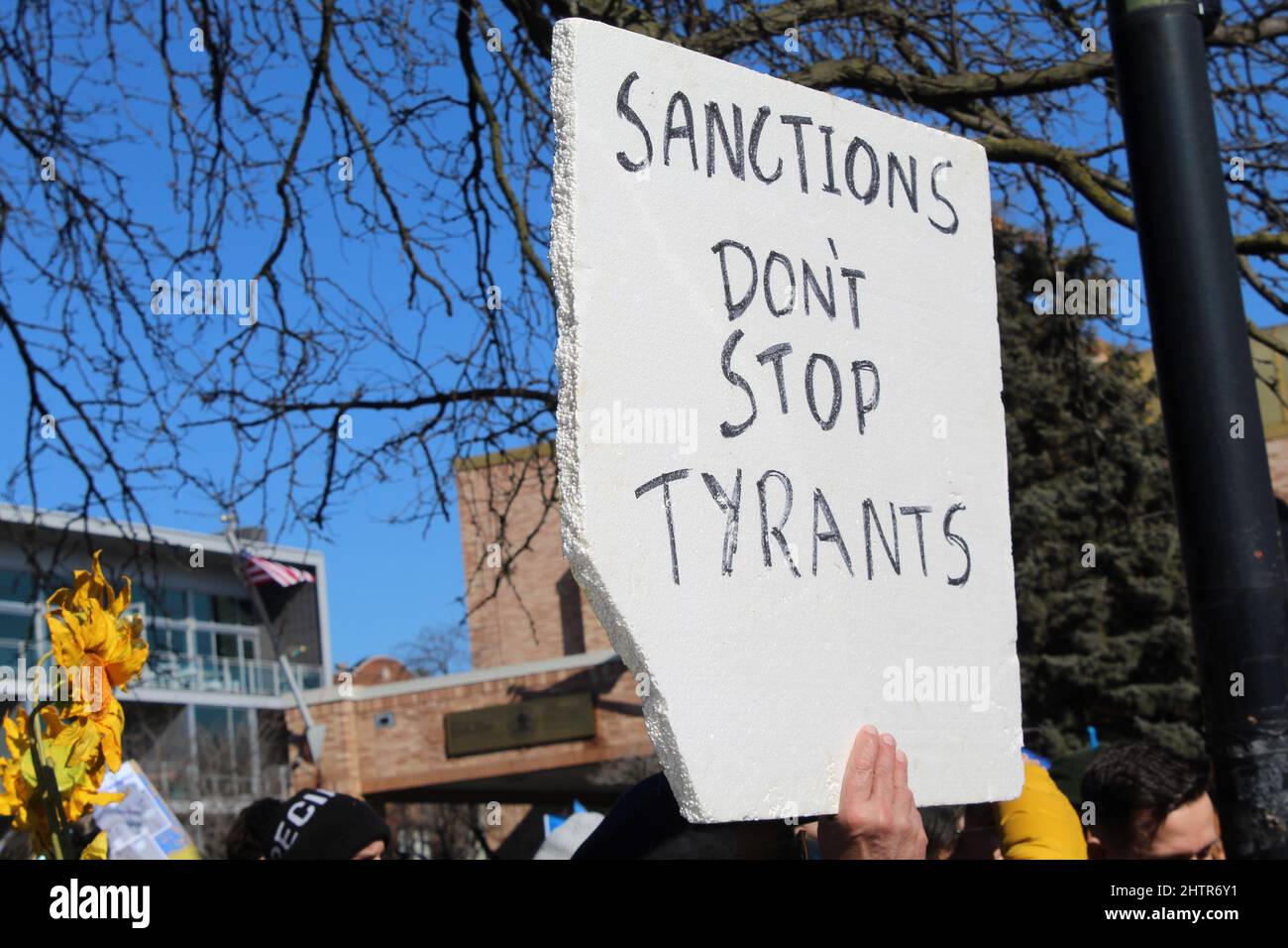 Sanctions Don't Stop Tyrants protest sign at Ukrainian Village in Chicago Stock Photo