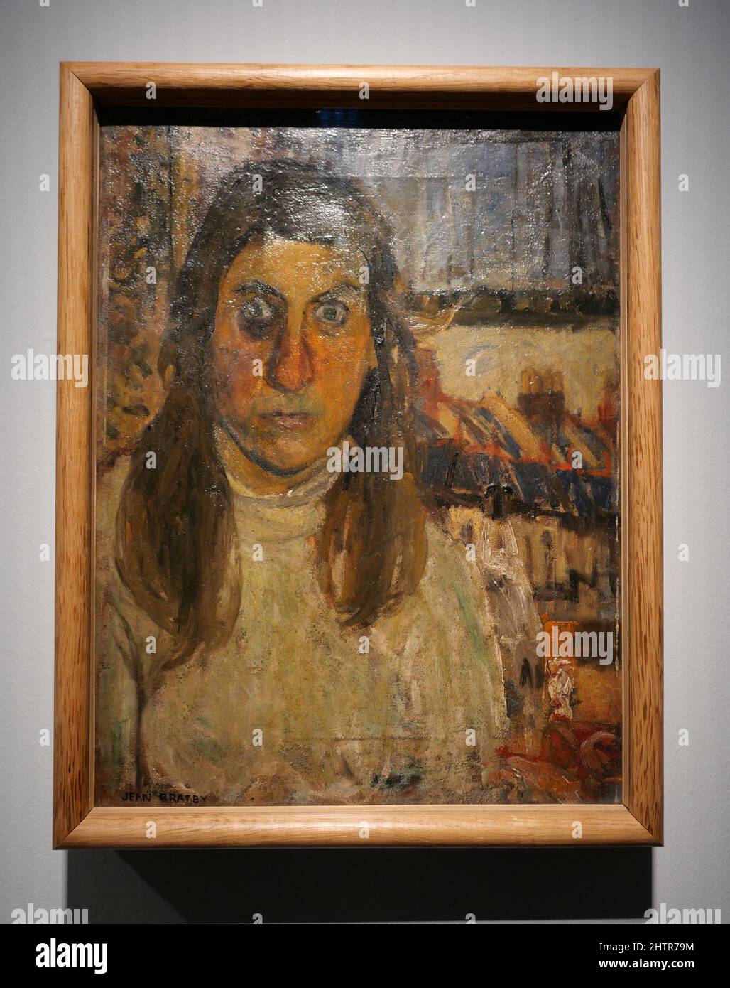 This astonishing painting shows Cooke staring directly at the viewer , framed by a cosy-looking interior which makes her blackened right eye appear even more troubling . Cooke's black eye could chronicle an act of violence but it is left ambiguous .the title , Mad Self -Portrait , implies perhaps ironically -that she is suffering from mental illness , or simply mad with rage Although in postwar Britain women were often cast as idealised wives , mothers and homemakers tending home for surviving soldiers , Cooke's self-portrait offers a far more disturbing depiction of womanhood . Stock Photo