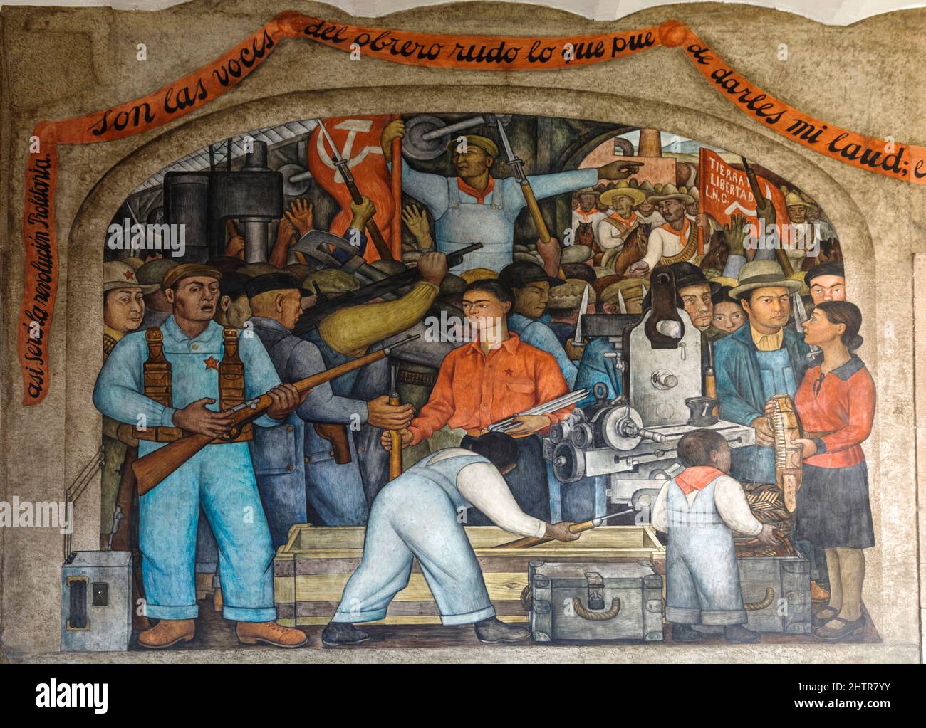 'The Arsenal' 1928 mural by Diego Rivera. Detail of the In the Arsenal artwork depicted here shows Frida Kahlo while she is handing out munition Stock Photo
