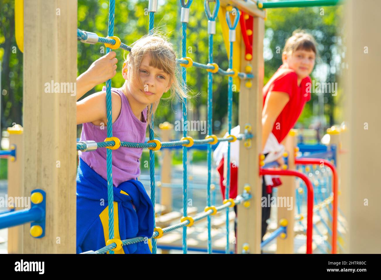 Portraits of two teenage girls on the playground Stock Photo - Alamy
