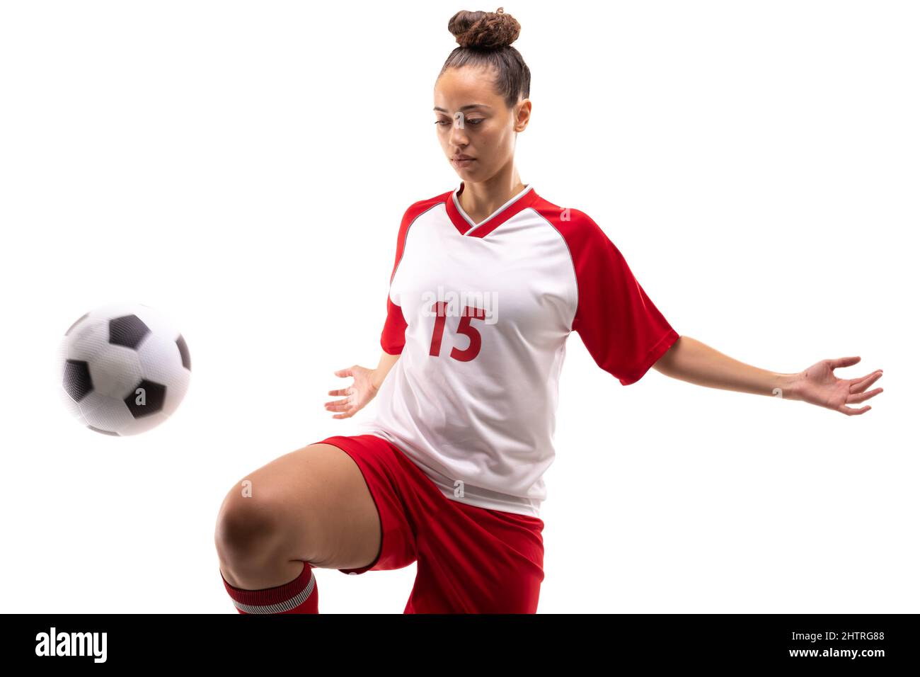 Faceless person standing with soccer ball between legs on grass · Free  Stock Photo