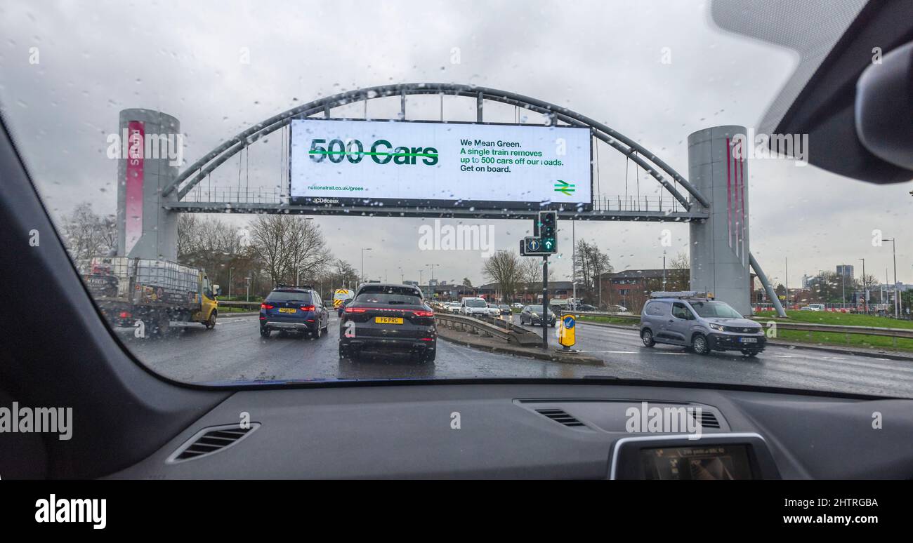 The massive arch gateway to Salford at the end of the M602 gets across the clean air message. Stock Photo