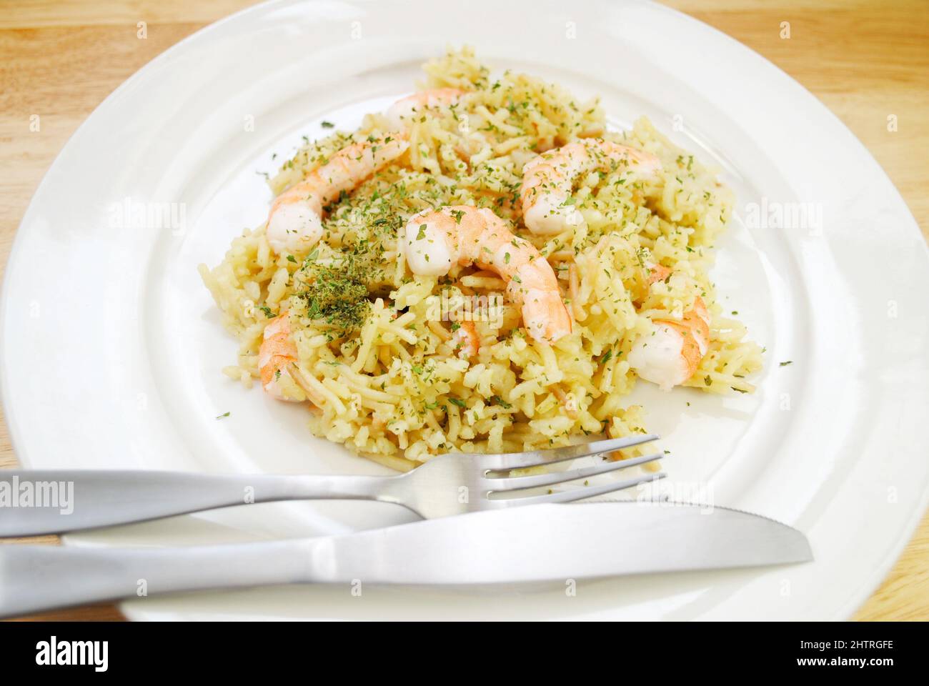 Plated Shrimp Scampi with Wild Rice and Vermicelli Stock Photo