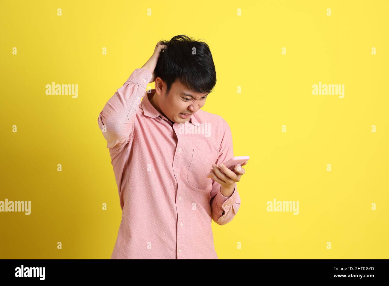 Serious young asian network hi-res stock photography and images - Alamy