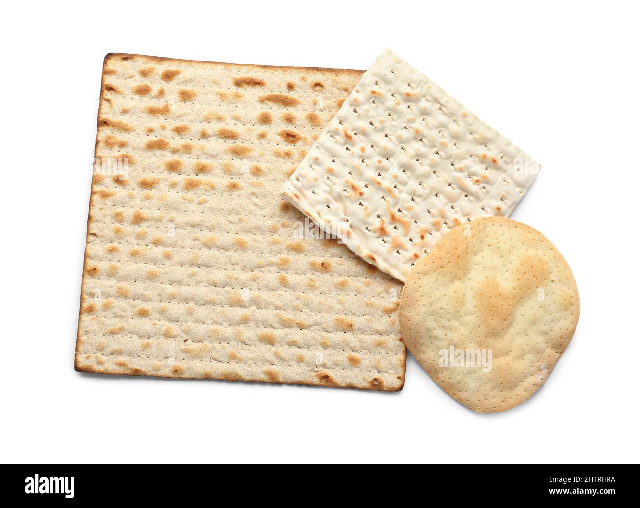 Different Jewish flatbread matza for Passover on white background Stock