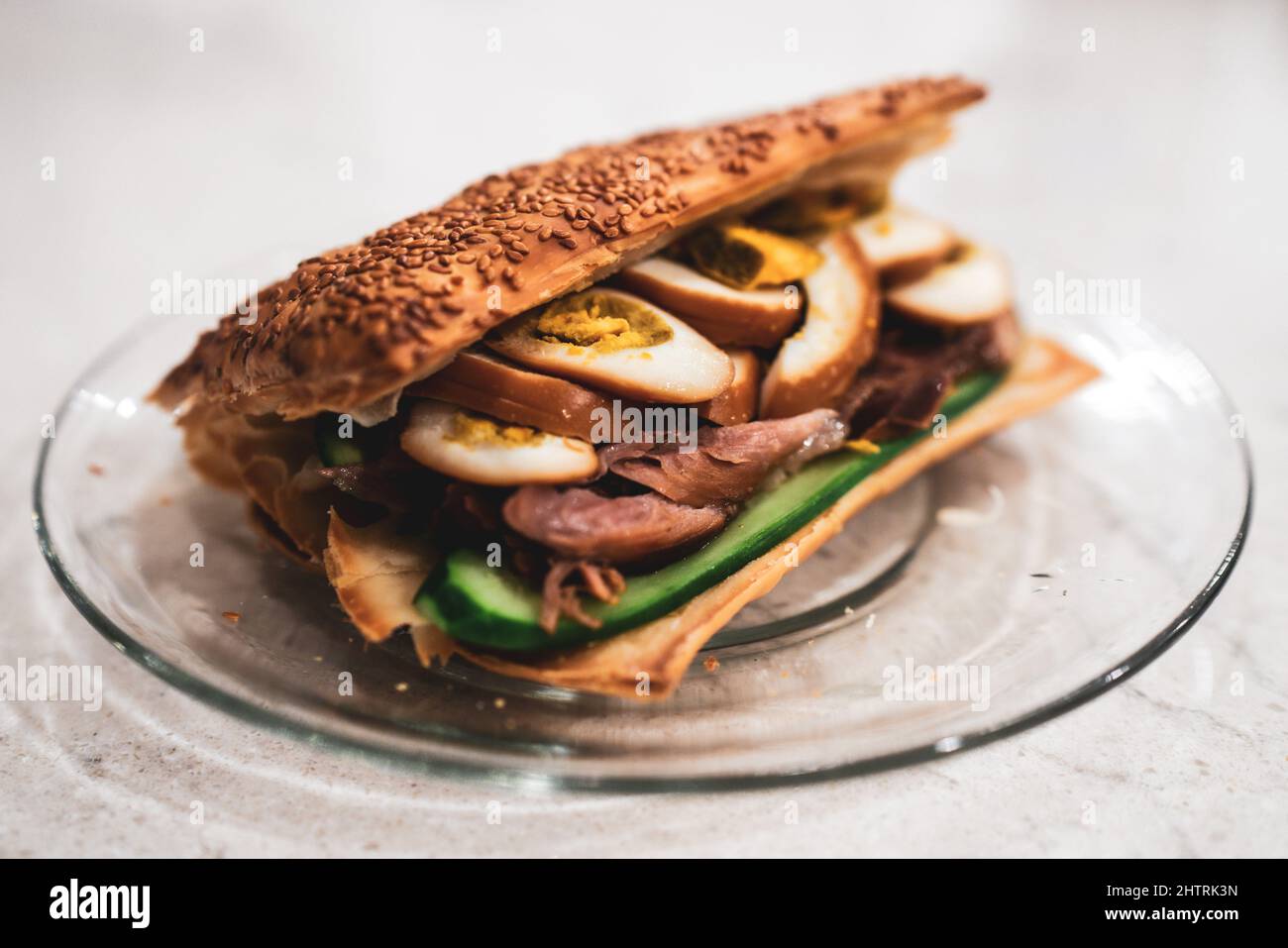 Sesame Flatbread Sandwich with SoyBraised Egg and Pork Stock Photo Alamy