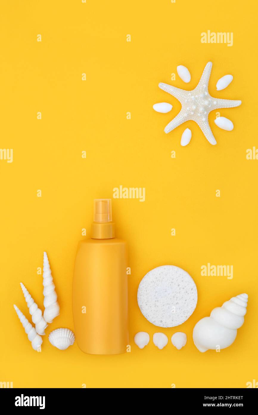 Suntan lotion safety health care concept with sun cream bottle for safe summer sunbathing protection with abstract starfish sun and seashells. Stock Photo