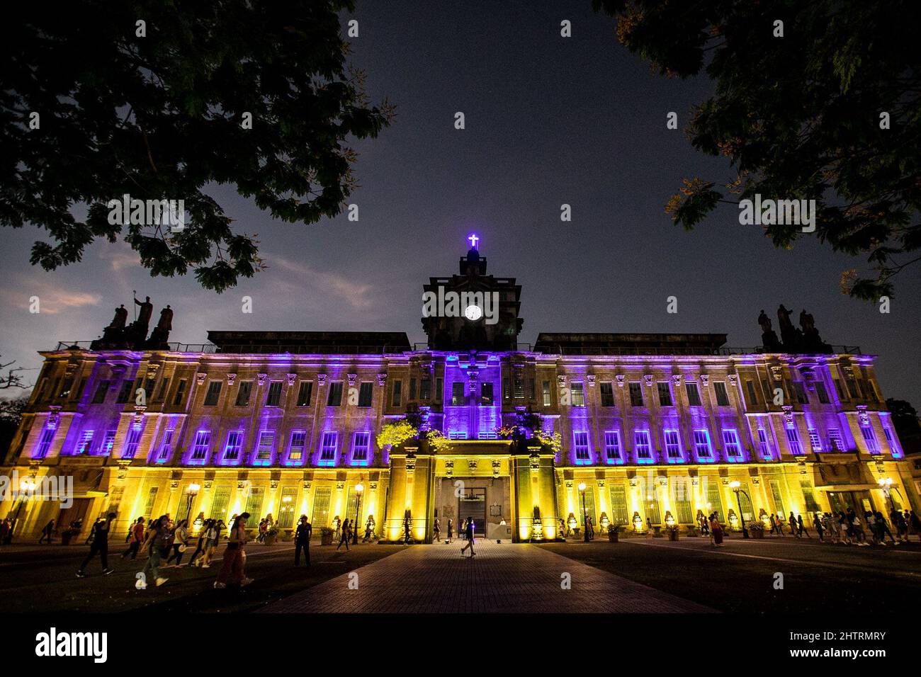 Manila, Philippines. 2nd Mar, 2022. The flag of Ukraine is projected on the UST Main Building as a show of support for the country at the University of Santo Tomas in Manila, Philippines. Other countries in Southeast Asia like Singapore and Indonesia have condemned Russia's invasion of Ukraine, while the Philippines has called for a peaceful resolution to the conflict and have expressed concerns over the safety of Filipinos fleeing from the war-stricken eastern European country. (Credit Image: © Basilio Sepe/ZUMA Press Wire) Stock Photo
