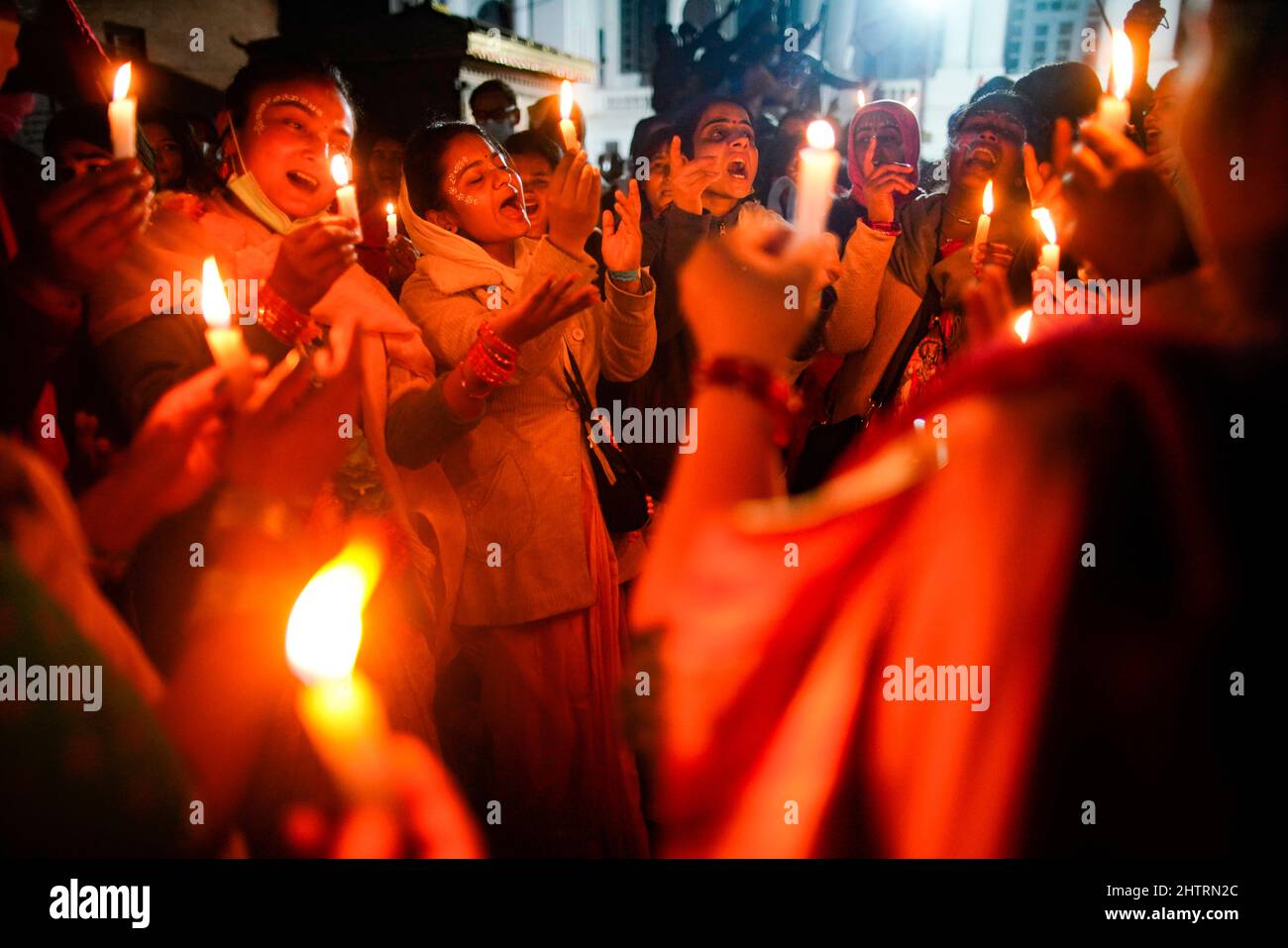 Kathmandu, Nepal. 2nd Mar, 2022. Hindu devotees from ISKCON Temple chant prayers during a candlelight vigil to end Russia's invasion of Ukraine and for world peace at Basantapur Durbar Square, a UNESCO World Heritage Site in Kathmandu, Nepal. (Credit Image: © Skanda Gautam/ZUMA Press Wire) Stock Photo