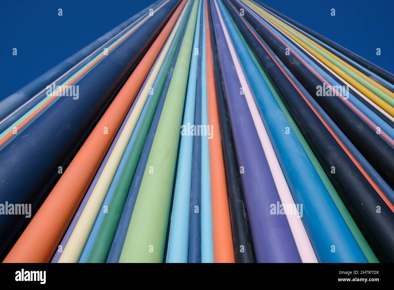 A wall with various colors and a blue sky in Paris Stock Photo