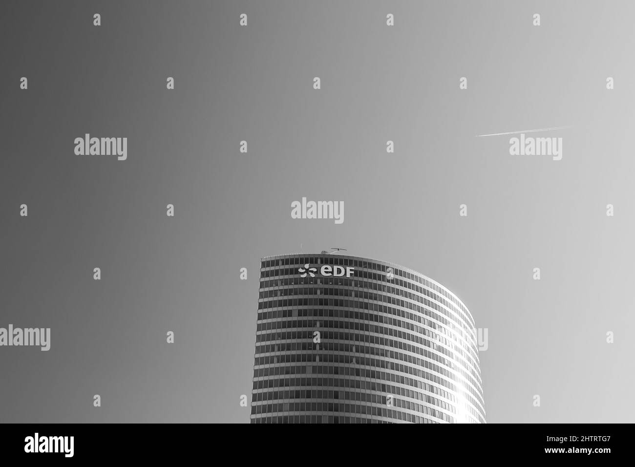 Paris, France - February 27, 2022 : The energy company EDF headquarter building in Paris in black and white Stock Photo