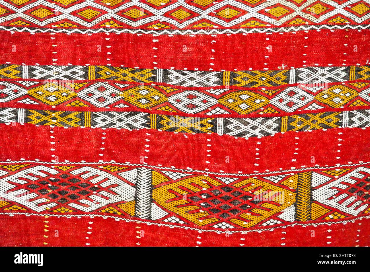 Textile Rugs Handmade pattern decorated cloth or textile rug on display at street ...