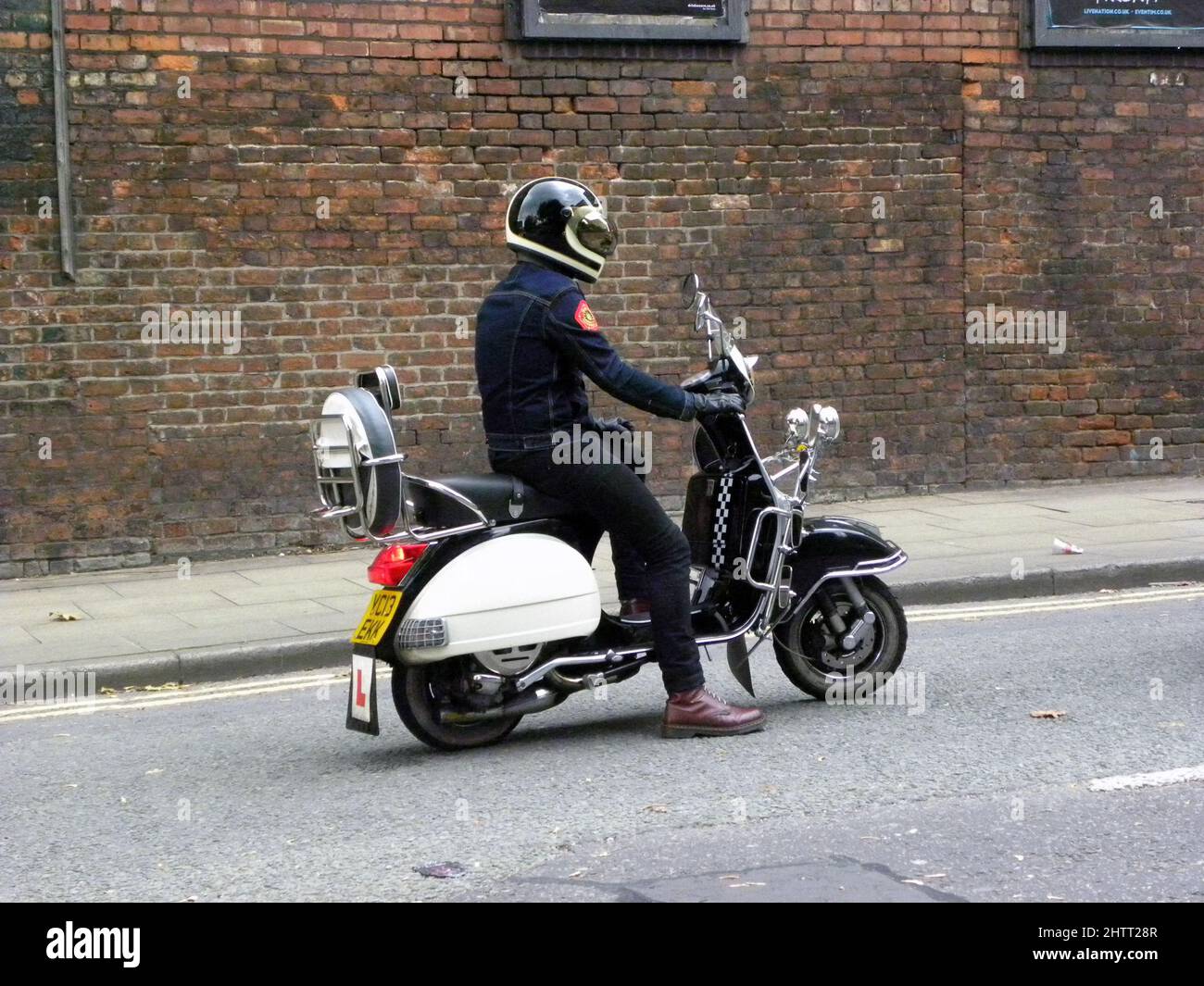 MANCHESTER. GREATER MANCHESTER. ENGLAND. 10-17-2016 Water Street. Scooter and Dr. Martens. Stock Photo