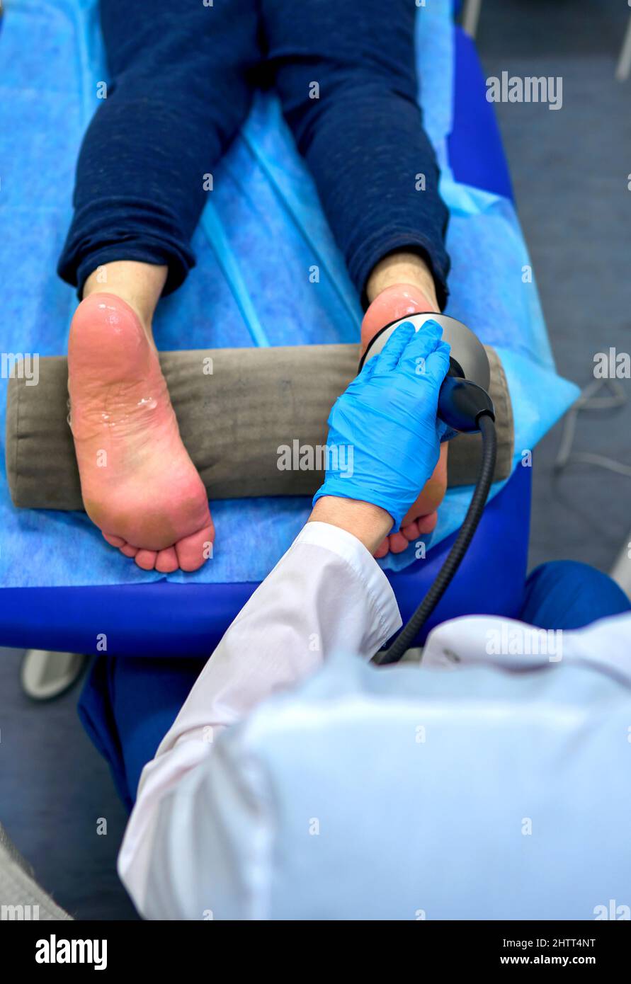 shock wave therapy procedure in the doctor's office Stock Photo Alamy
