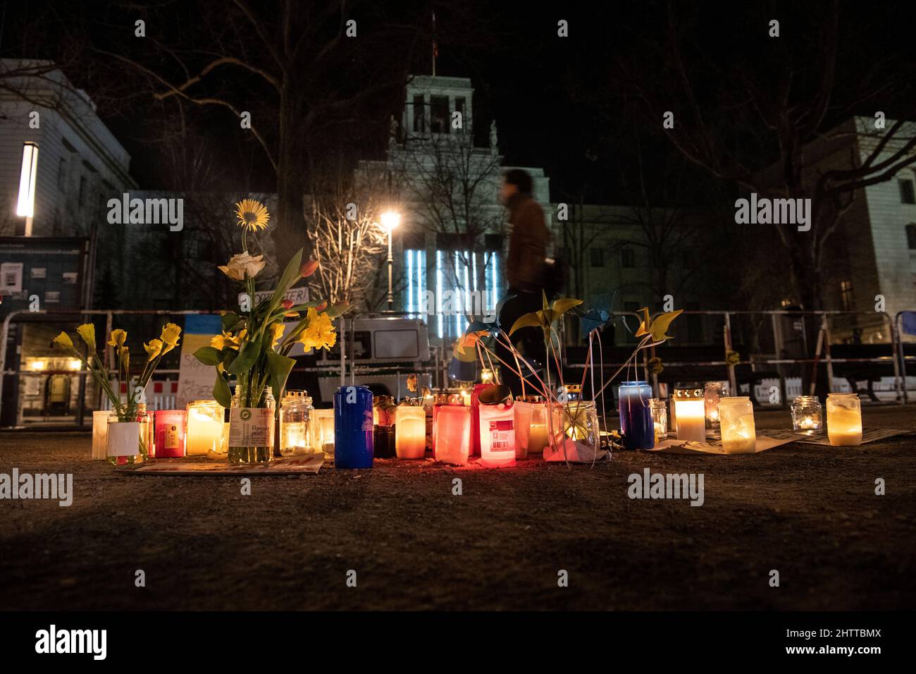 Berlin, Germany. 02nd Mar, 2022. Candles and flowers in Ukrainian