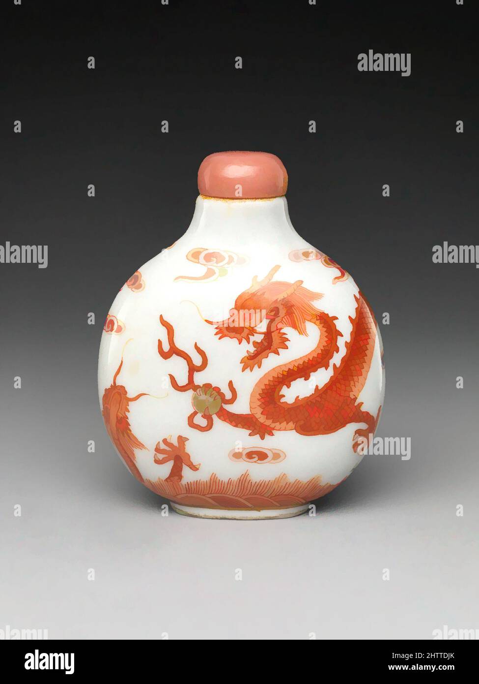 Snuff Bottle with Dragons Chasing Pearl, Qing dynasty (1644–1911), Daoguang mark and period (1821–50), China, Porcelain with coral stopper, H. 2 11/16 in. (6.8 cm), Snuff Bottles Stock Photo