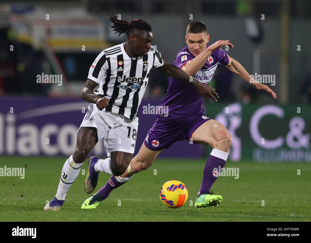 Florence, Italy. 21st May, 2022. Moise Kean of Juventus FC and Nikola  Milenkovic of ACF Fiorentina compete for the ball during the Serie A  2021/2022 football match between ACF Fiorentina and Juventus