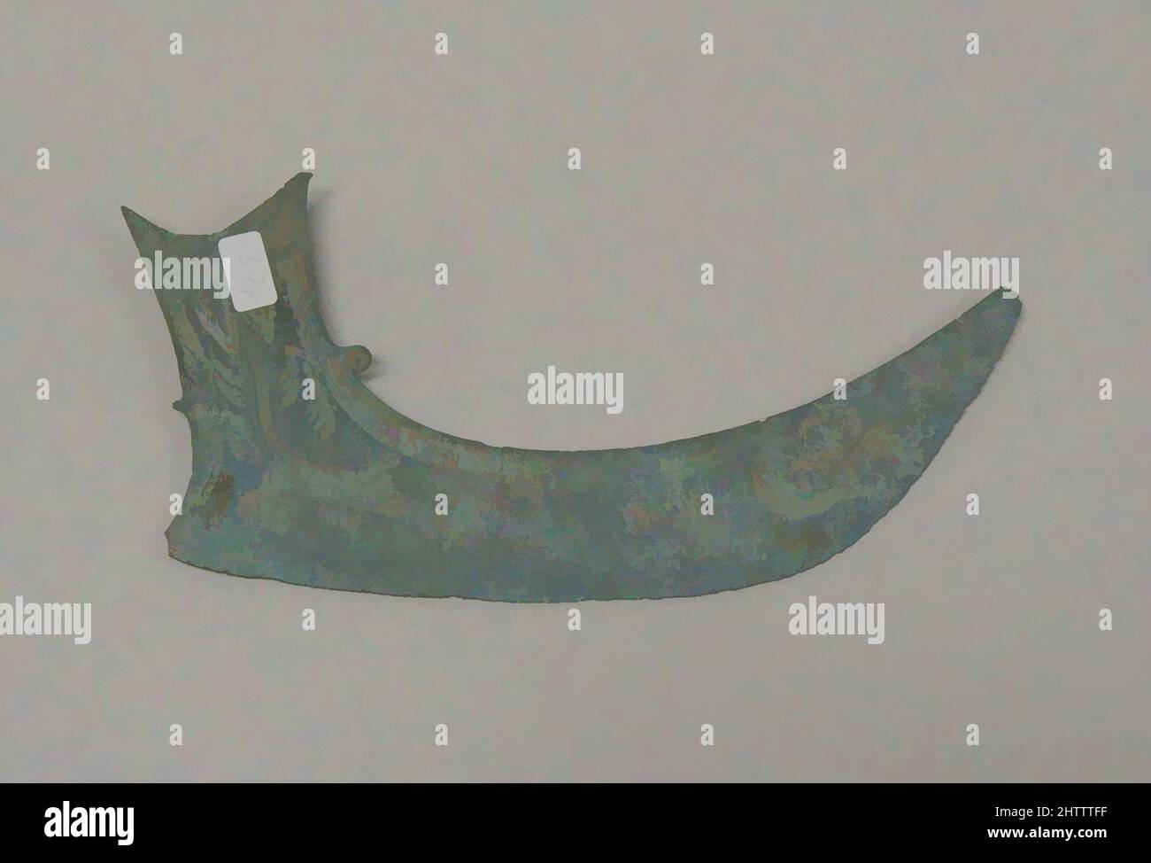 Art inspired by Boat-Shaped Hafted Ax, Bronze and Iron Age period, Dongson culture, 500 B.C.–A.D. 300, Vietnam (North), Bronze, H. 4 1/2 in. (11.4 cm); W. 7 3/16 in. (18.3 cm); D. 3/4 in. (1.9 cm), Metalwork, Classic works modernized by Artotop with a splash of modernity. Shapes, color and value, eye-catching visual impact on art. Emotions through freedom of artworks in a contemporary way. A timeless message pursuing a wildly creative new direction. Artists turning to the digital medium and creating the Artotop NFT Stock Photo