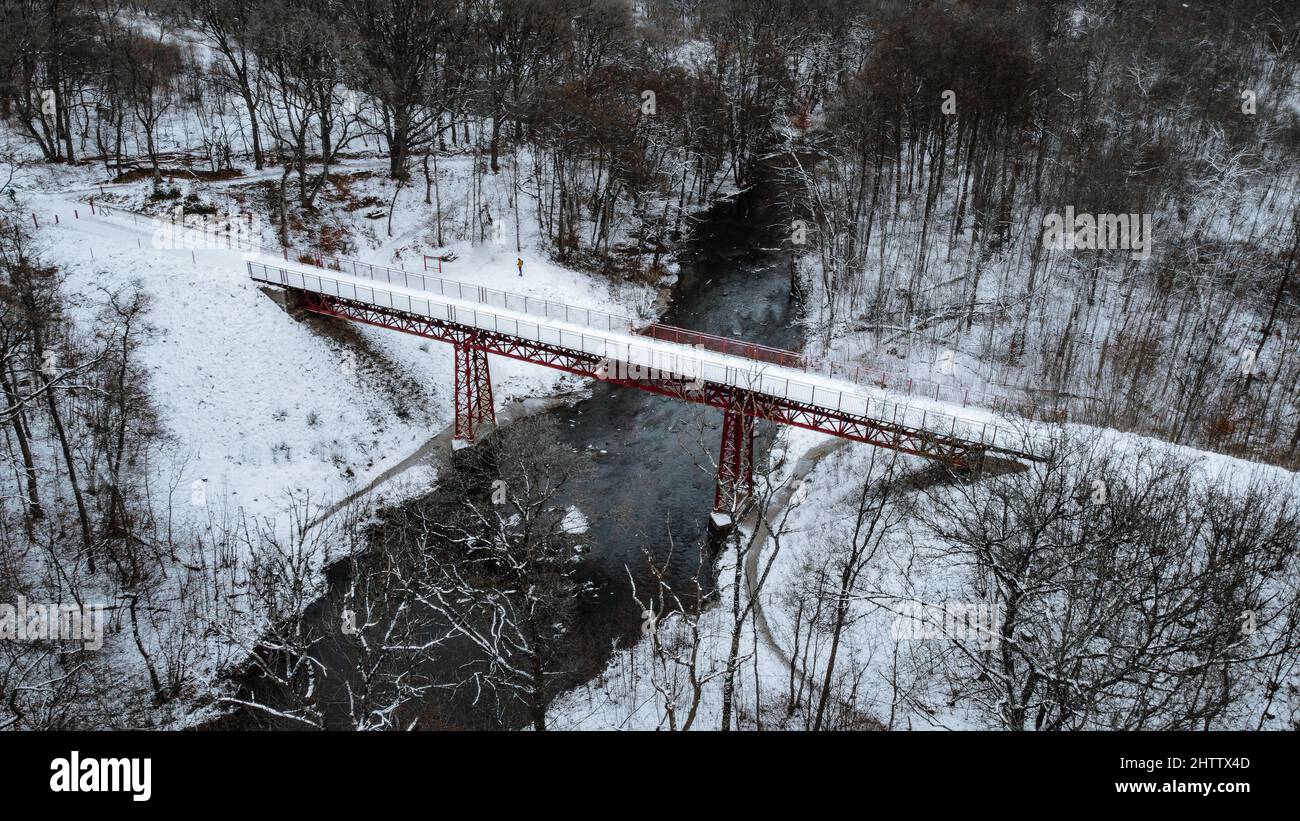 Aerial view of a long bridge covered with snow Stock Photo - Alamy