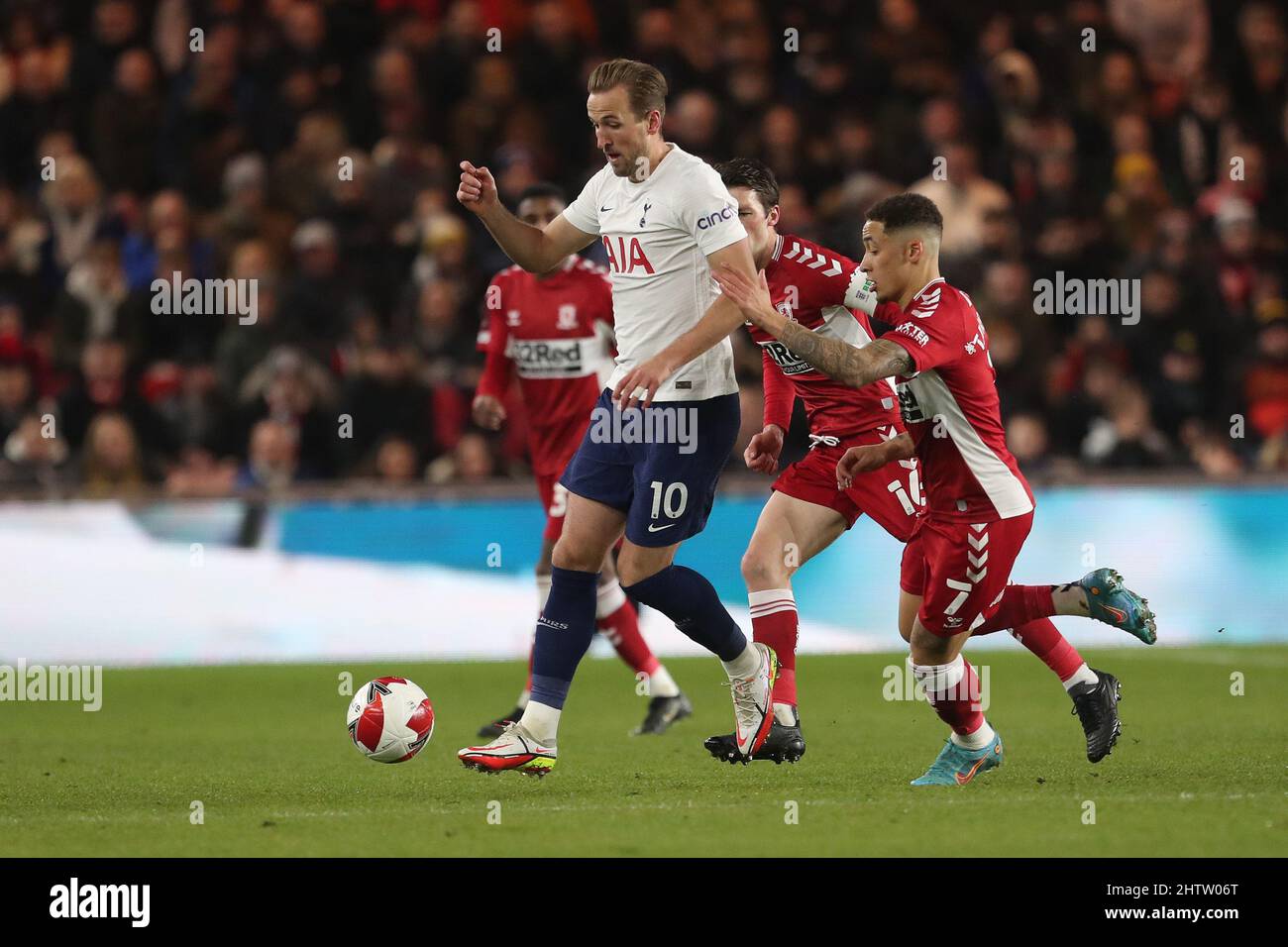 MIDDLESBROUGH, UK. MAR 1ST Tottenham Hotspur's Harry Kane in action with Marcus Tavernier and Jonathan Howson of Middlesbrough during the FA Cup Fifth Round match between Middlesbrough and Tottenham Hotspur at the Riverside Stadium, Middlesbrough on Tuesday 1st March 2022. (Credit: Mark Fletcher | MI News) Credit: MI News & Sport /Alamy Live News Stock Photo