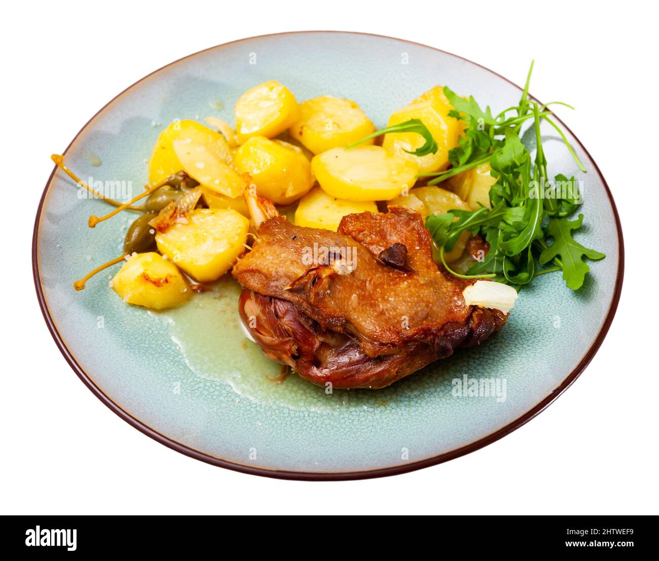 Fried duck confit with roasted potatoes Stock Photo