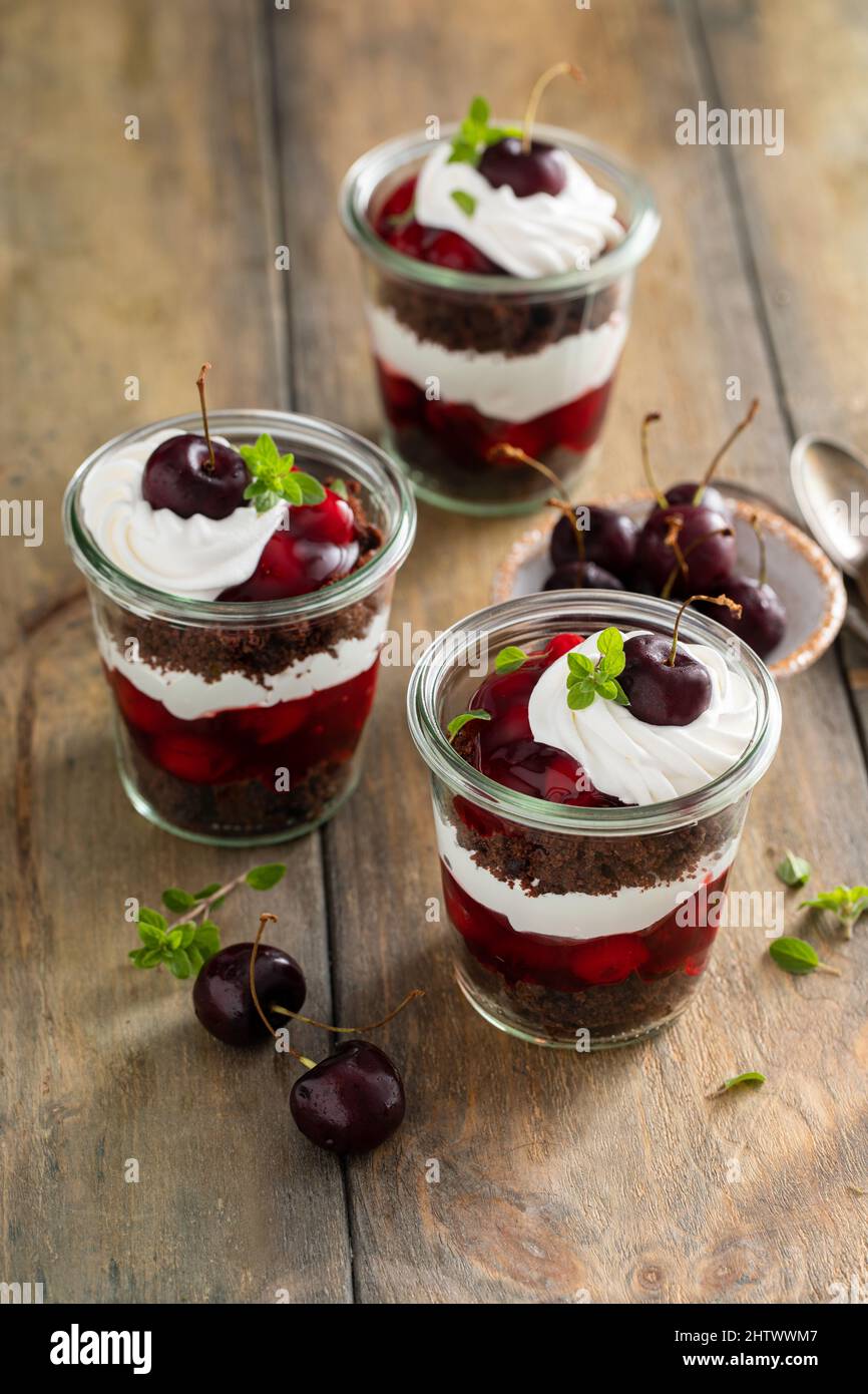Black forest trifles, dessert in jars concept Stock Photo Alamy