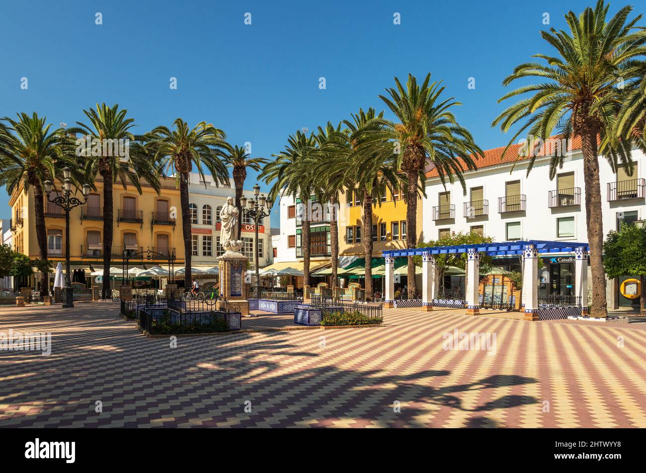 Ayamonte, Spain - July 29, 2021: View of Plaza de la Laguna in Ayamonte, Spain, with the Inmaculada Concepcion monument in the center of the square. Stock Photo