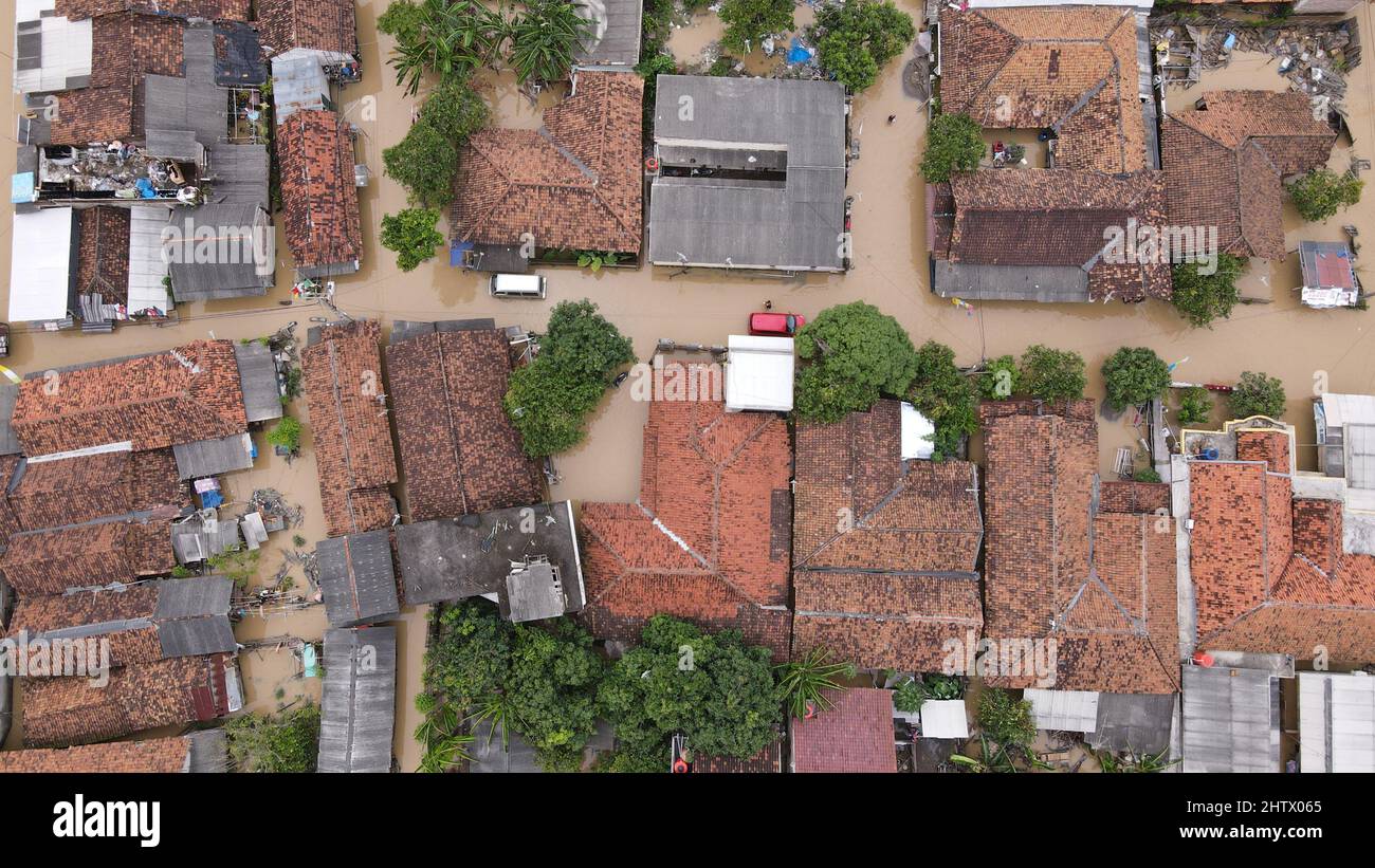 Serang, Indonesia. 2nd Mar, 2022. Aerial photo shows houses submerged by floods in Sukajaya village of Serang, Banten Province, Indonesia, March 2, 2022. Credit: Shanum Rustika/Xinhua/Alamy Live News Stock Photo
