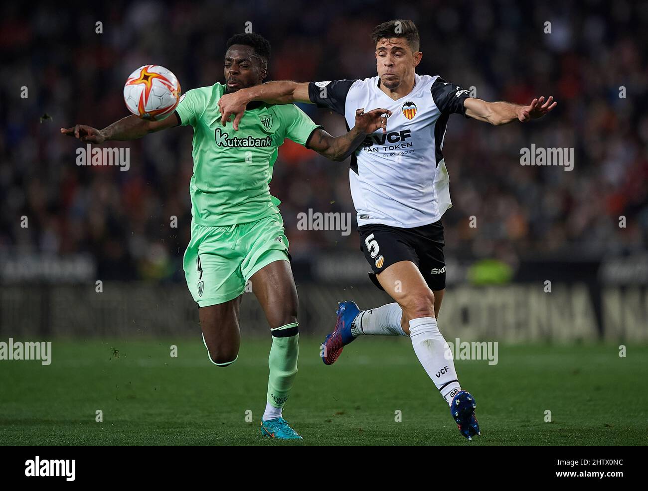 Valencia, Spain. 2nd Mar, 2022. Valencia's Gabriel Paulista vies with Athletic Bilbao's Inaki Williams during the King Cup semifinal second leg match between Valencia and Athletic Bilbao in Valencia, Spain, March 2, 2022. Credit: Str/Xinhua/Alamy Live News Stock Photo